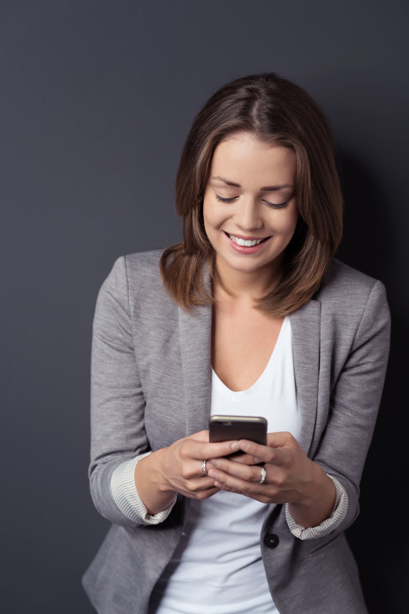 Business Woman Typing on Phone